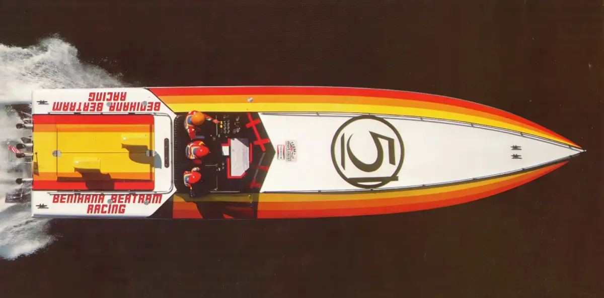 Overhead view of Benihana powerboat cockpit showing three-man crew positions with driver, throttleman and navigator