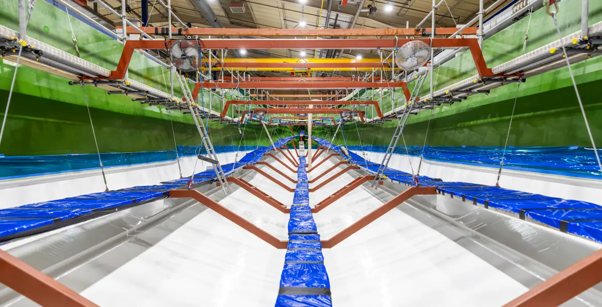 Colleagues gather for the hull lamination ceremony of the Sunseeker 134 Superyacht