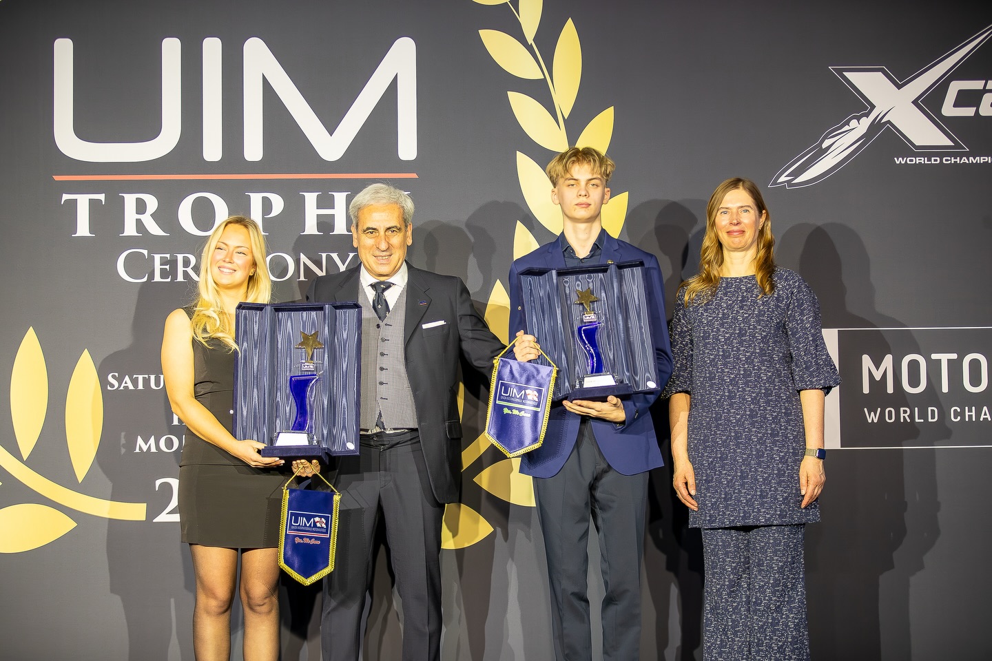 Mathilda Wiberg with UIM President Dr Raffaele Chiulli and Paul Richard Laur at the UIM Trophy Ceremony, Fairmont Monte Carlo