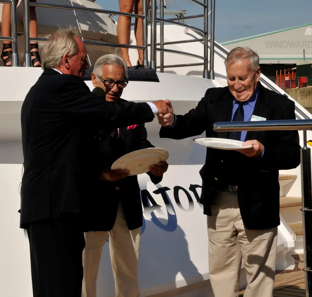 Robert Braithwaite presents Ray Bulman with a commemorative award at the 2009 Southampton Boat Show