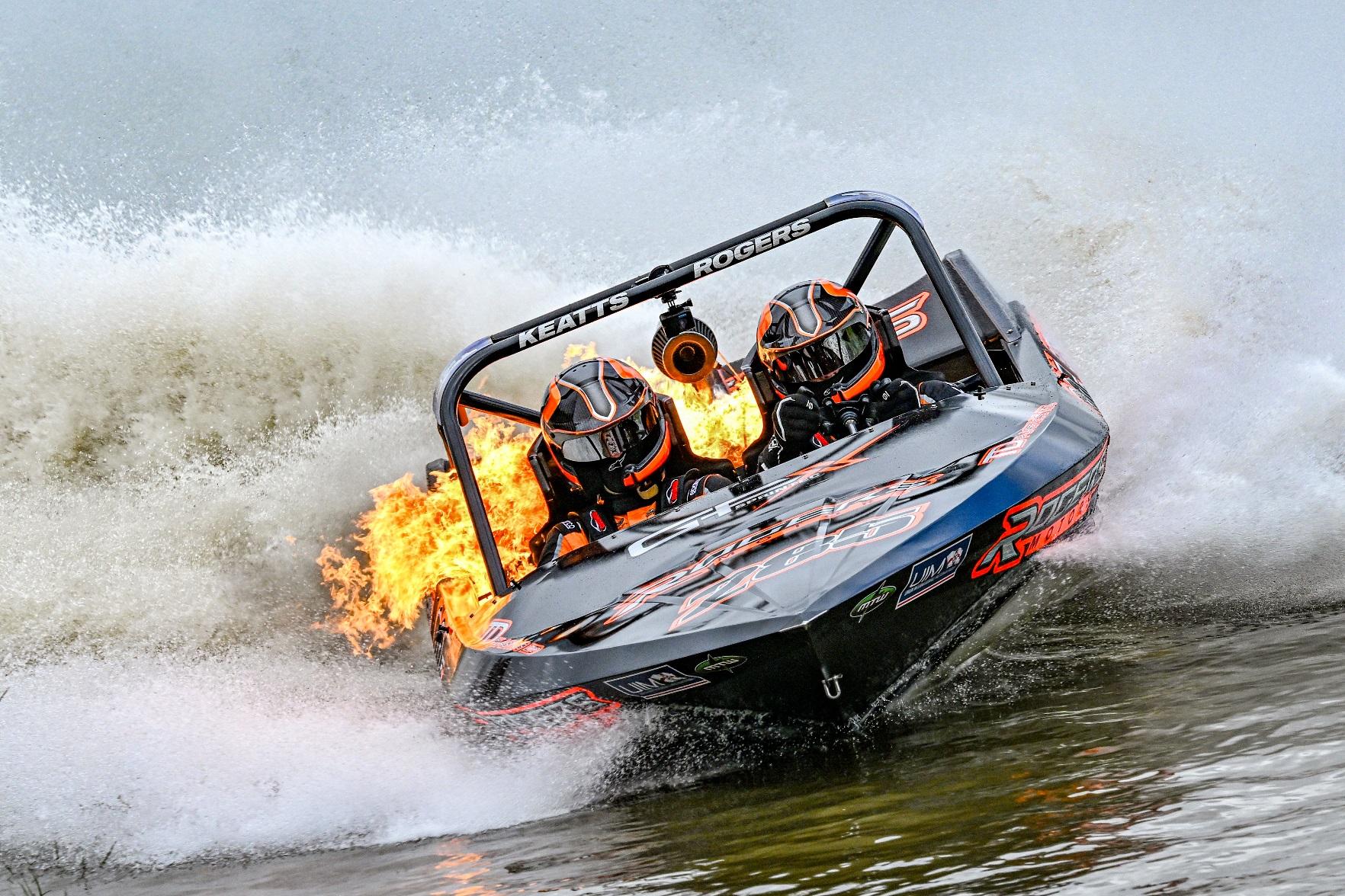 Open category gold: a jet sprint boat with flames shooting from the exhaust at Wanganui, New Zealand