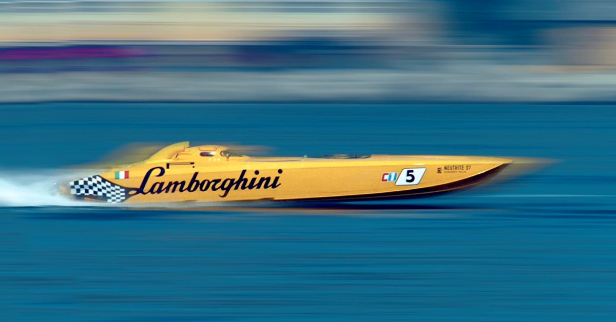 Yellow Lamborghini Class 1 offshore racing catamaran number 5 at speed with motion blur