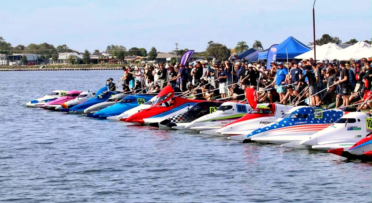 GP formula tunnel boats lined up on the dock at the Australian Formula Powerboat Grand Prix, Yarrawonga 2026 - 15-boat field including Sam Lucas, Rhys Coles and Will Parker