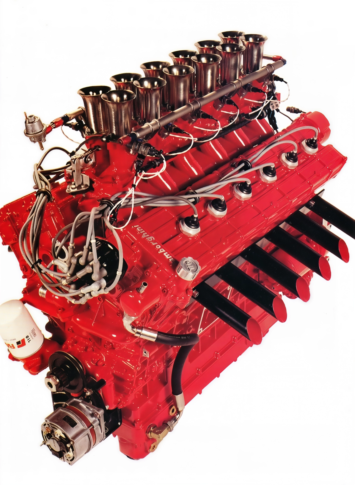Lamborghini L804 V12 offshore racing engine showing twelve velocity stacks, 880 hp, red finish