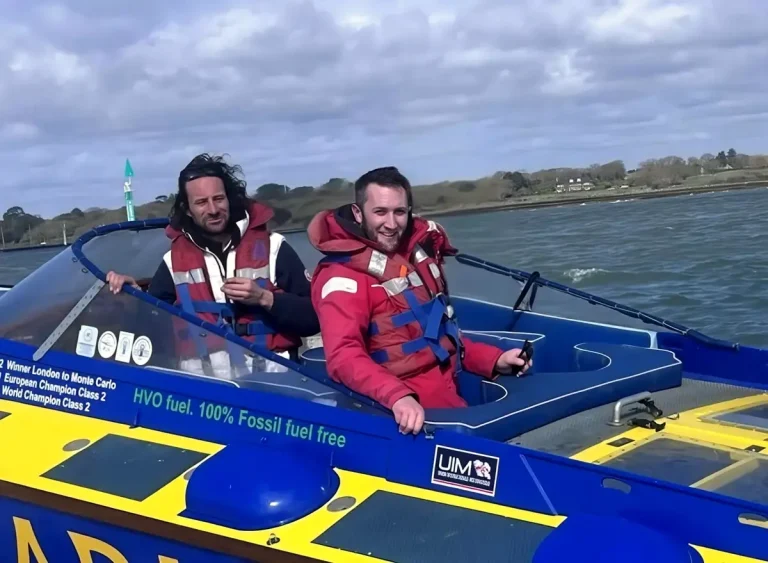 Peter Bonham Christie and Dan Lee aboard Apache 555 on the water
