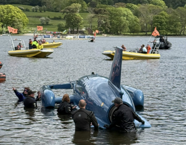 Bluebird K7 on Coniston Water during the 2026 festival, the hydroplane's first appearance on the lake since Donald Campbell's fatal crash in January 1967
