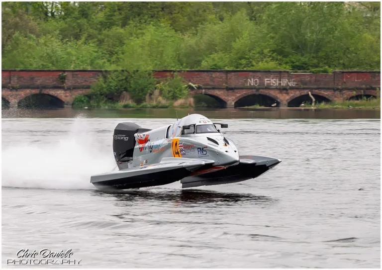 Ian Blacker in the Kingfisher Fire and Security Racing Team Formula 2 catamaran number 14, powered by the Mercury Racing APX four-stroke engine, testing at Carr Mill Dam in May 2026