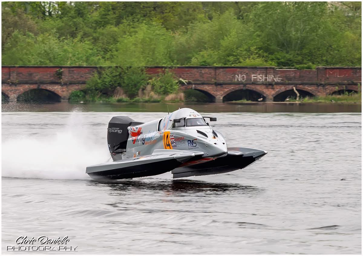 Ian Blacker in the Kingfisher Fire and Security Racing Team Formula 2 catamaran number 14, powered by the Mercury Racing APX four-stroke engine, testing at Carr Mill Dam in May 2026