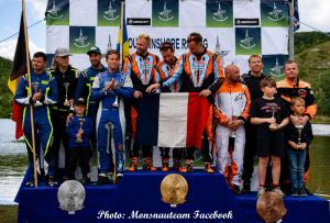 The podium at the 24 Heures Motonautiques de Normandie 2026 at Poses — Touax Gulf Racing world champions, Monsnauteam vice-champions, Team Torpilleur Racing third