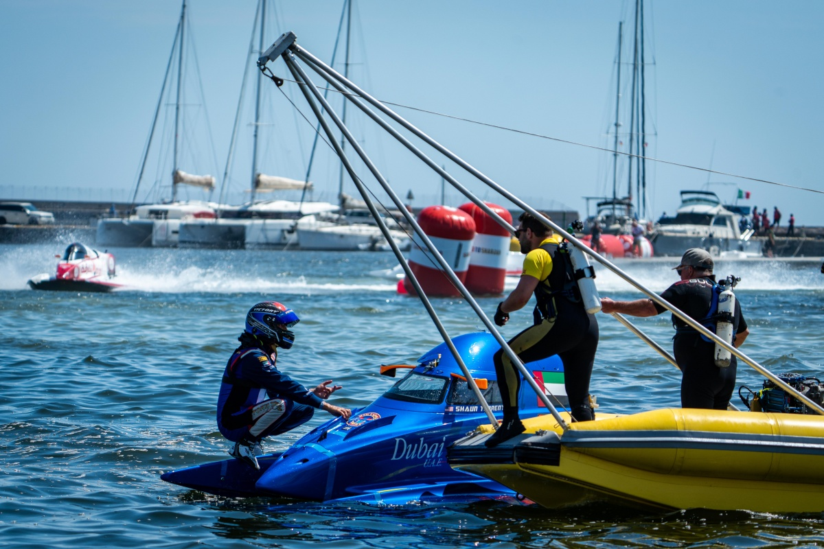 Shaun Torrente on the sponson of his Victory Team DAC in Cagliari harbour with the Osprey Powerboat Rescue Team