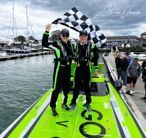 Rob Lockyer and Adrian de Ferrenti celebrate victory on Good Boy Vodka at the 2026 MDL Marinas Shamrock Round the Island