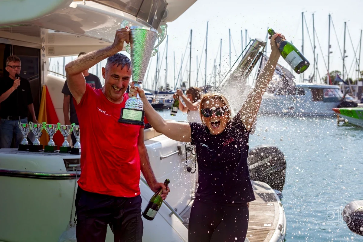 Champagne prizegiving celebrations at Haslar Marina during a UKOPRA powerboat race event