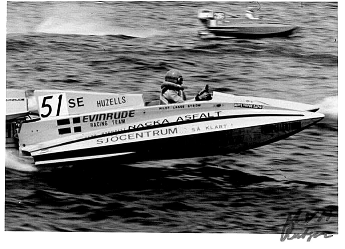 Lars Strom in his Huzells Evinrude Racing Team SE class catamaran, boat number 51, 1974