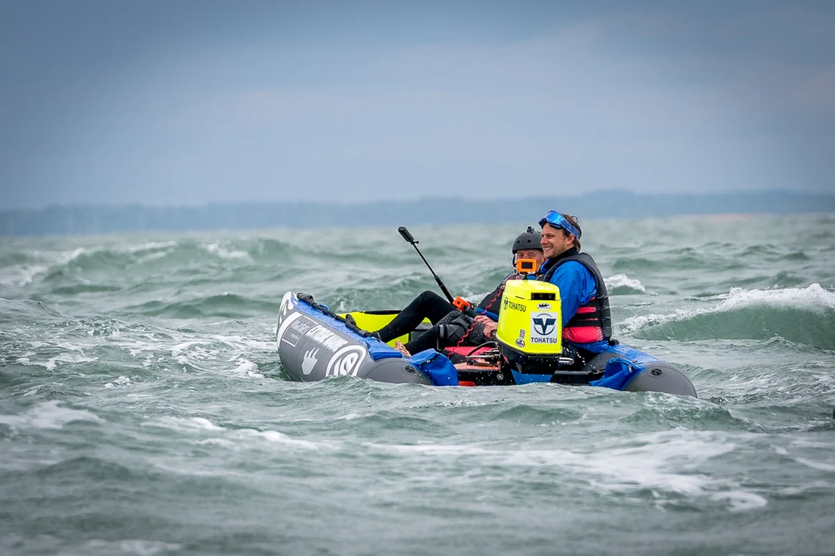 William Evans of Snap Photography on the ThunderCat media boat with a friend at the MDL Marinas Shamrock Round the Island 2026