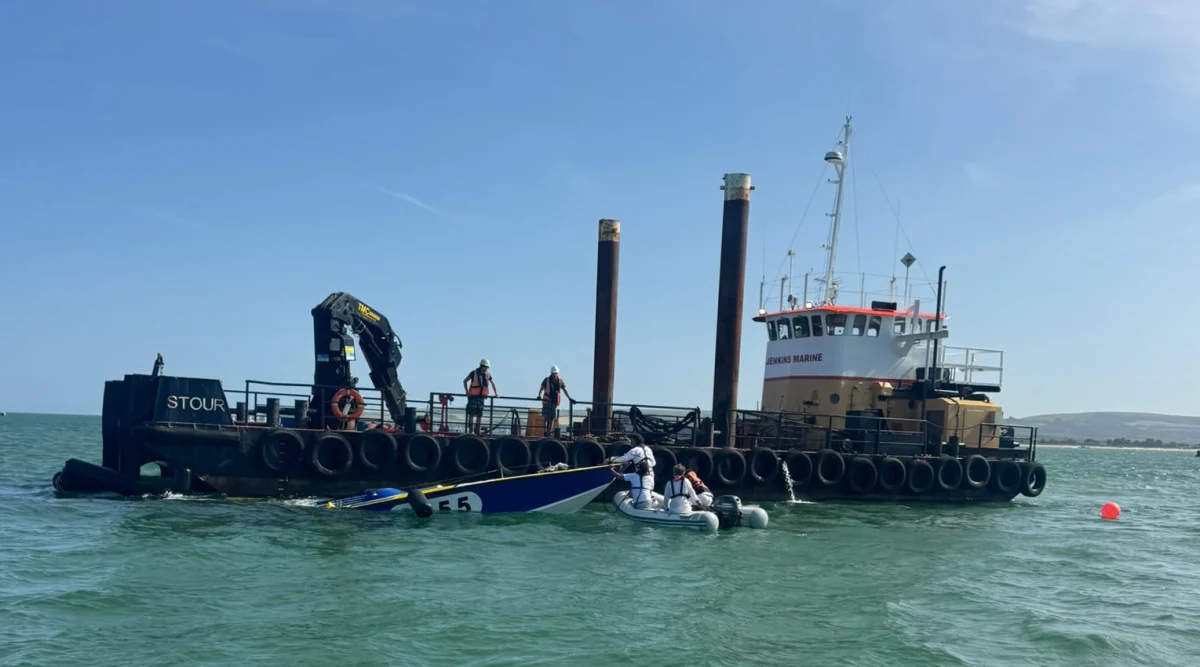 Apache 555 submerged alongside the Jenkins Marine barge Stour during recovery operations