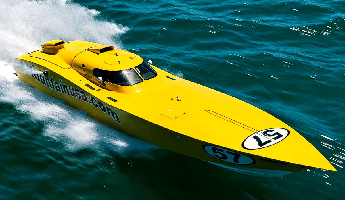 Fountain USA No. 57 yellow superboat at speed, 2000.