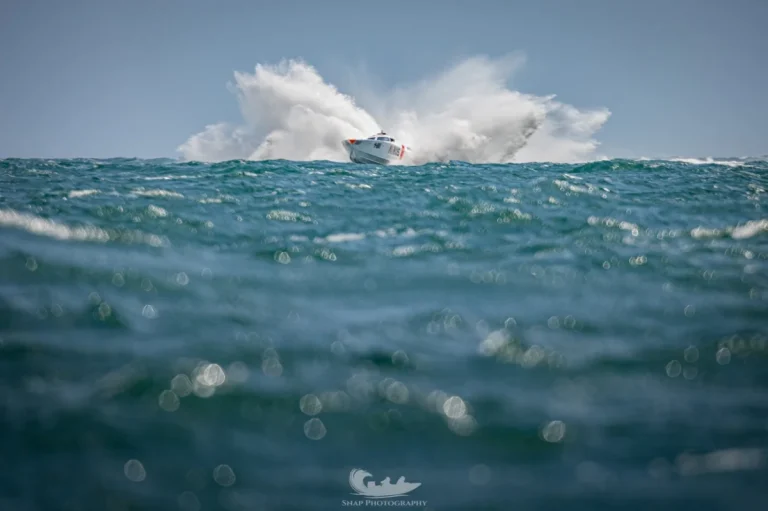 Gary Aldington's boat launches off a wave during UKOPRA offshore racing