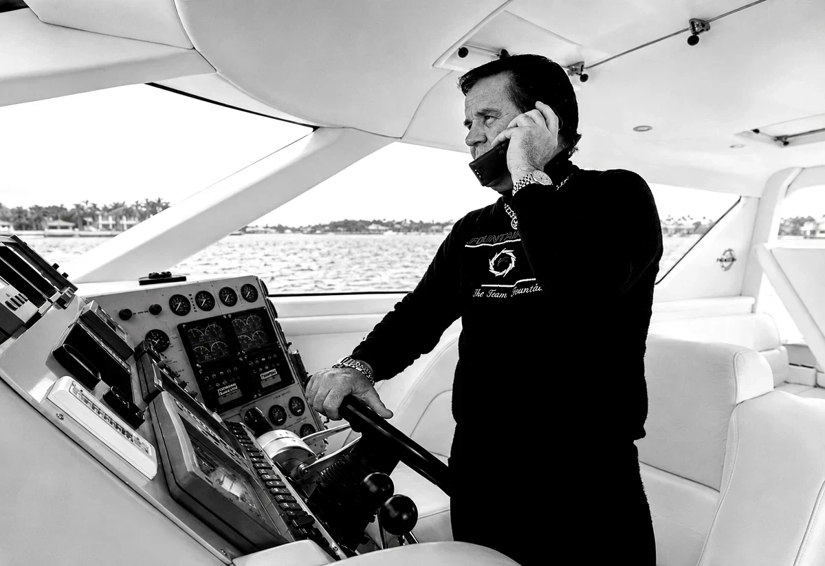 Reggie Fountain at the helm of a Fountain express cruiser, Miami, 2000.
