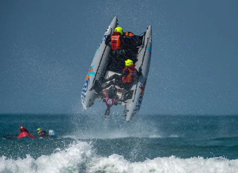 Thundercat inflatable racing boat airborne at Fistral Beach Cornwall