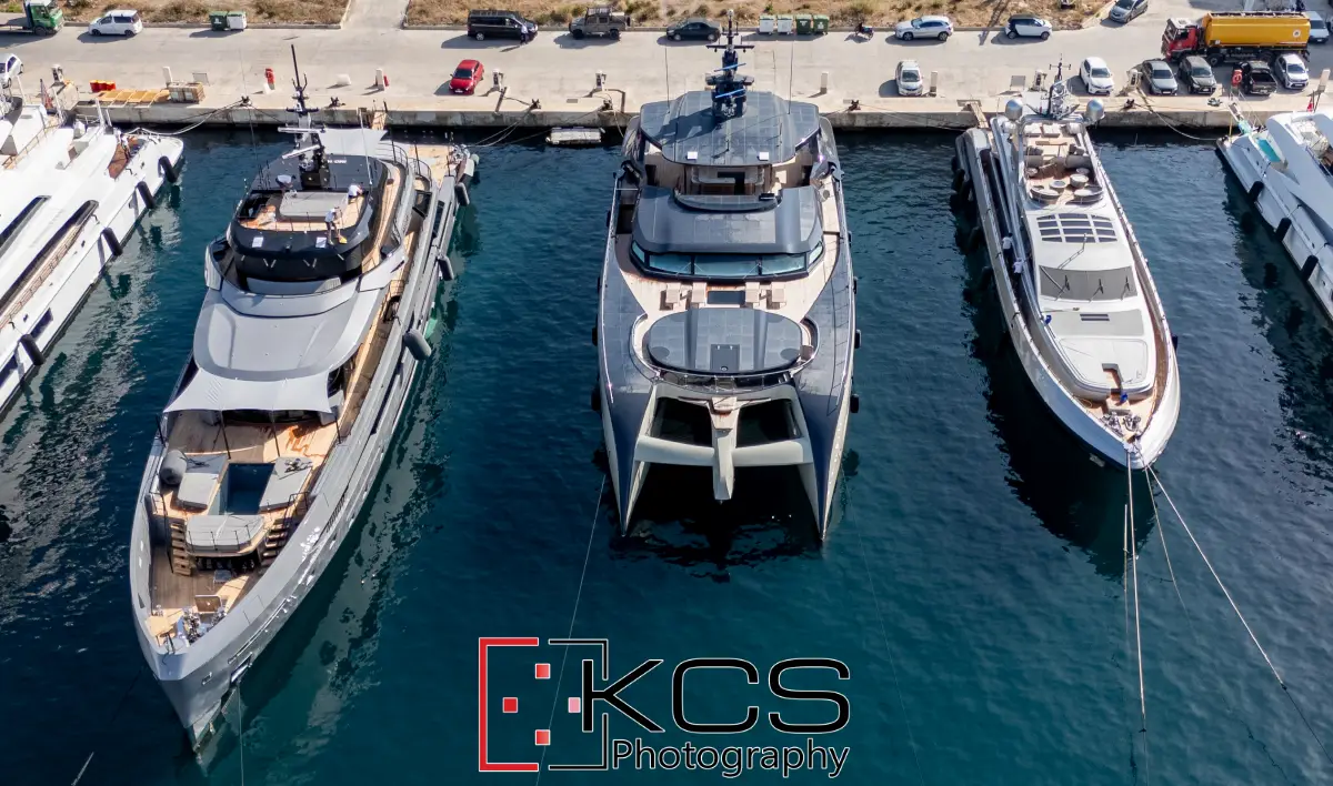 Aerial view of Rossinavi catamaran Seawolf X berthed between two monohull superyachts at Grand Harbour Marina, Malta