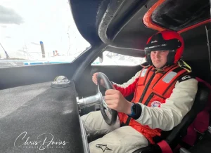 Anton Modin at the wheel of Double Trouble in the cockpit at Mercury Yacht Harbour, Hamble, ahead of UKOPRA Round 4 2026