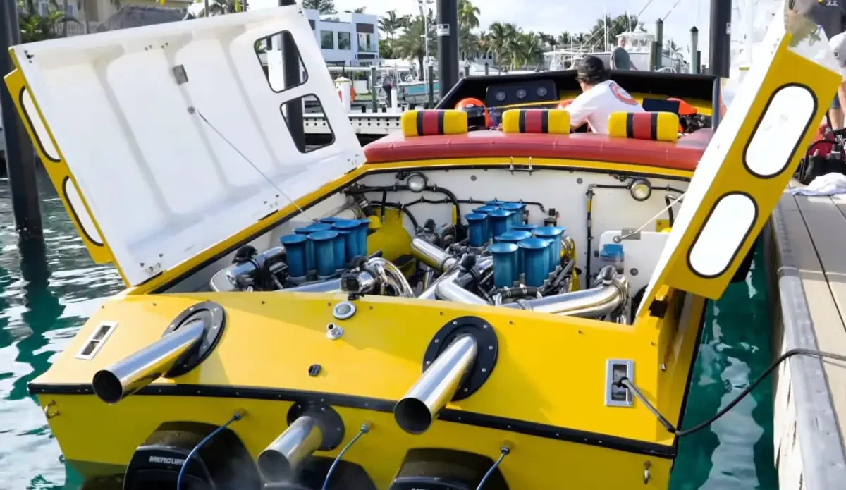 Open engine bay of Apache 47 Hull 001 dockside showing triple engine installation