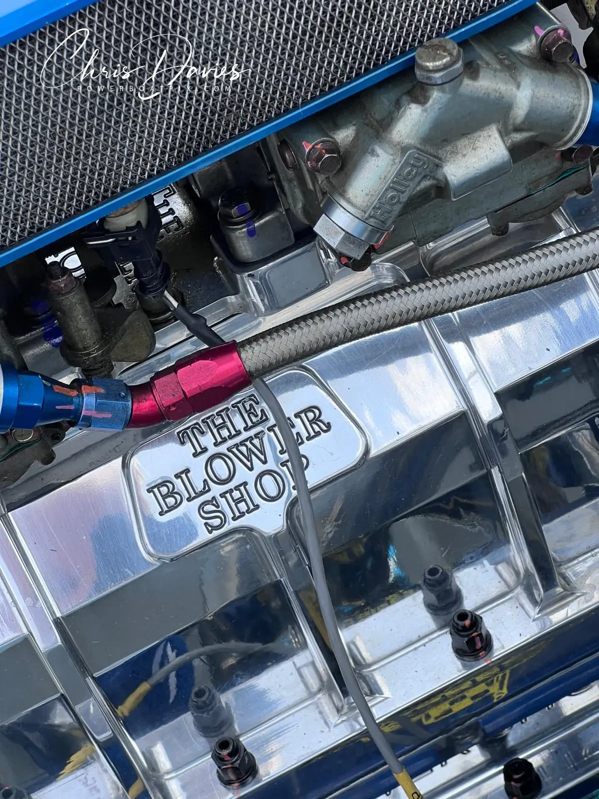 Supercharged Express engine detail in Double Trouble showing The Blower Shop blower case and Holley fittings