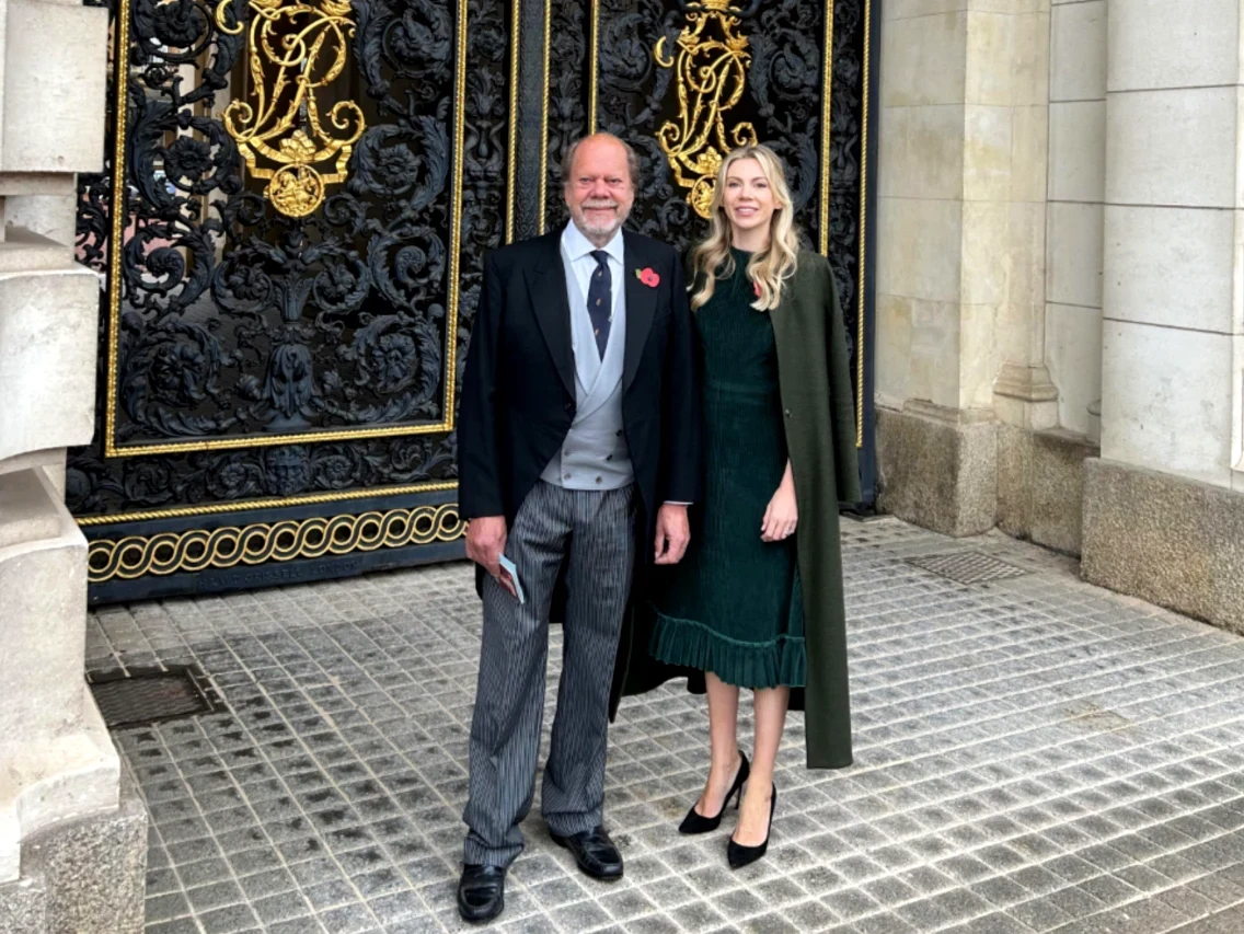 John Caulcutt with daughter Sophie outside Buckingham Palace after receiving his CBE