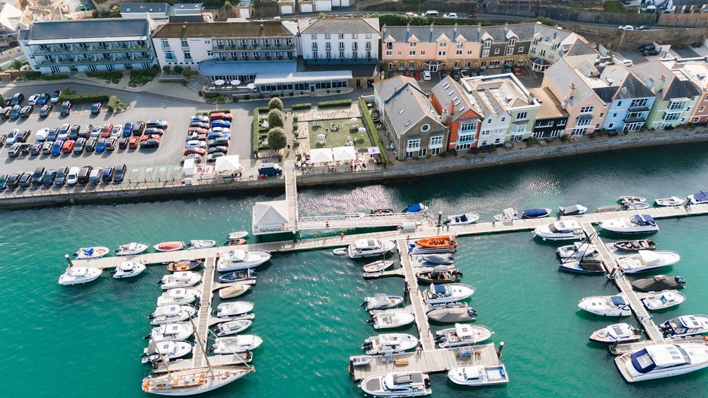 Dartmouth waterfront buildings and marina berths