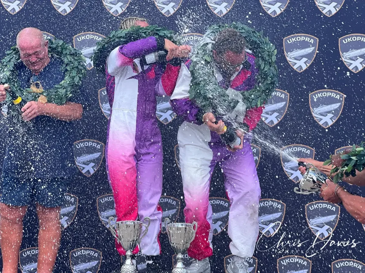 Rush Racing celebrate with champagne and laurel wreaths on the podium at UKOPRA Round 4, the MDL Marinas Mercury Offshore Grand Prix 2026