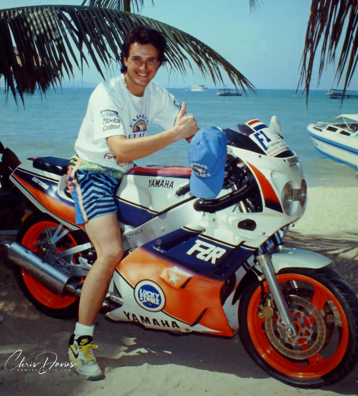 Fabrizio Bocca on a Yamaha motorbike on a beach in Pattaya, Thailand, 1992, wearing Rainbow Team kit