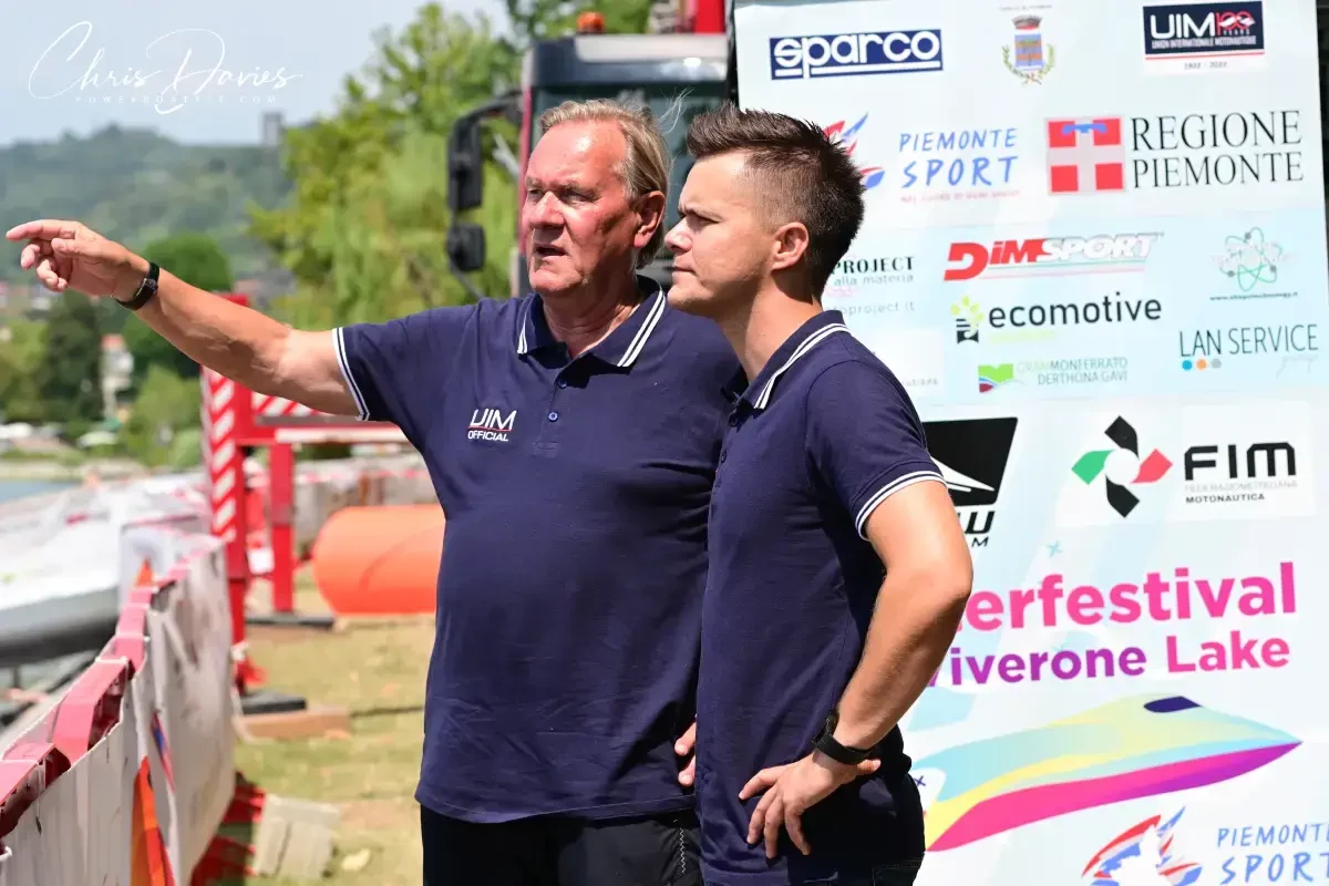 Aron Tabori with UIM Sports Commissioner Pelle Larsson at Lake Viverone, both wearing UIM Official polo shirts