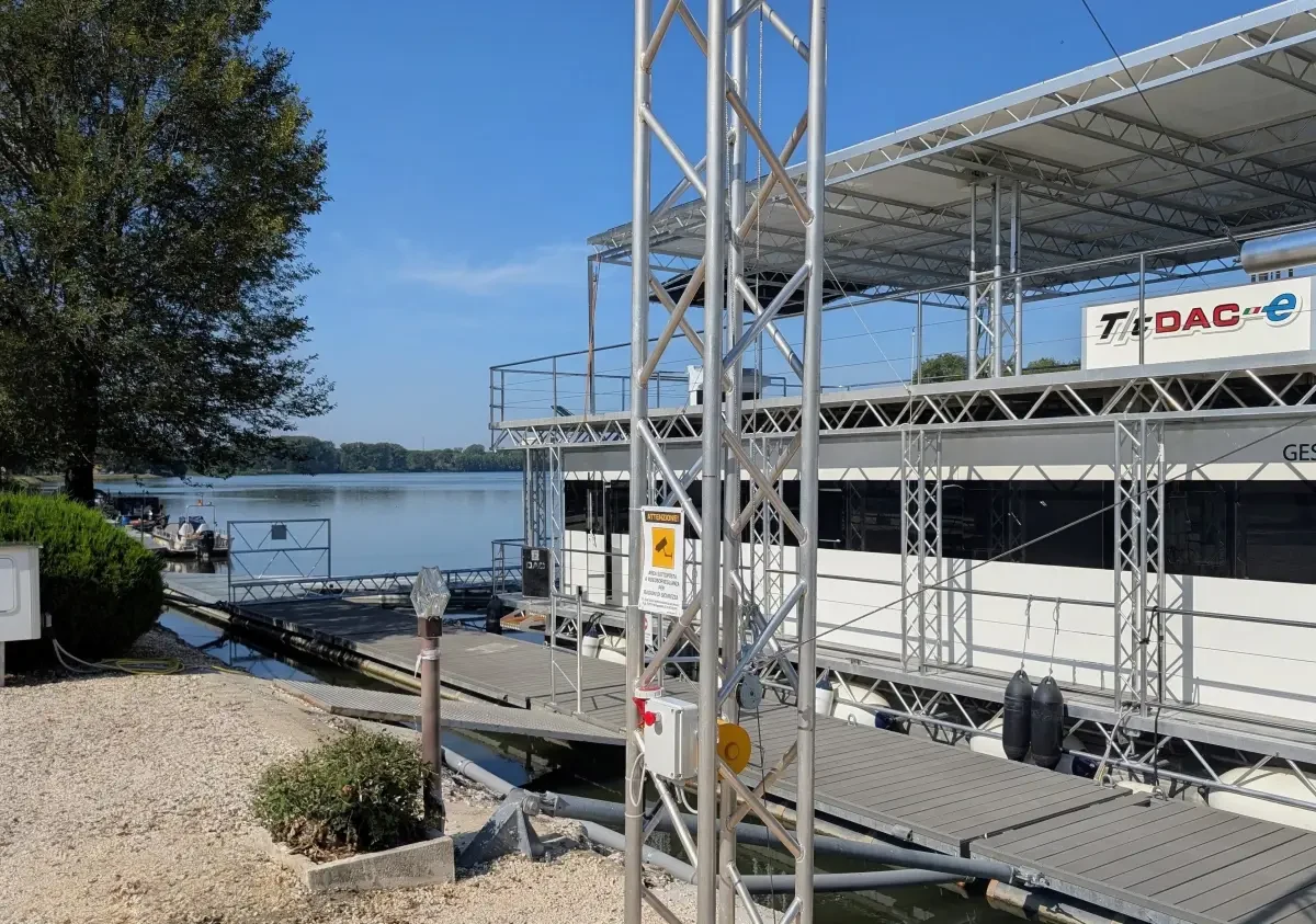 Guido Cappellini's DAC waterborne events centre moored at San Nazzaro