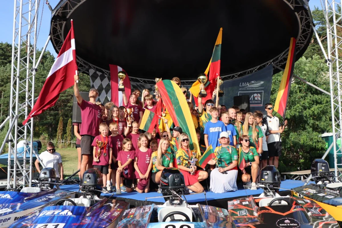 Teams celebrate on stage at the close of the Formula Future World Championship in Kaunas