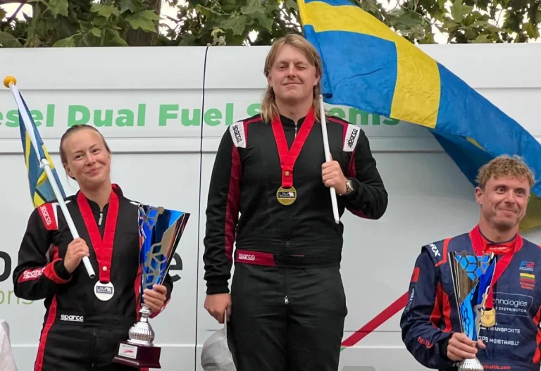 Hilmer Wiberg celebrates winning the 2026 UIM F2 European Championship on the podium at Viverone, with runner-up Mathilda Wiberg and third placed Edgaras Riabko