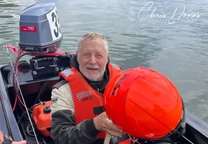 Mike Manning in the pits at Stewartby with his T850 powerboat helmet