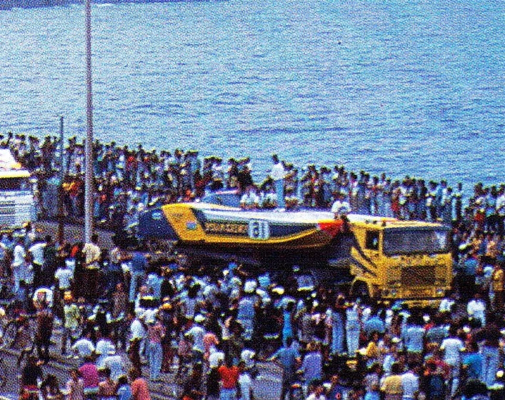 A Class 1 boat is transported through huge crowds during the pre-race parade in Havana, 1995