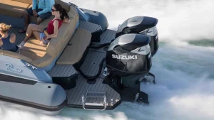 Twin Suzuki DF350A outboards powering a Ranieri boat at speed