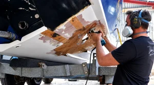 Apache 555 undergoing hull repair work following the Poole Bay 100 debris strike