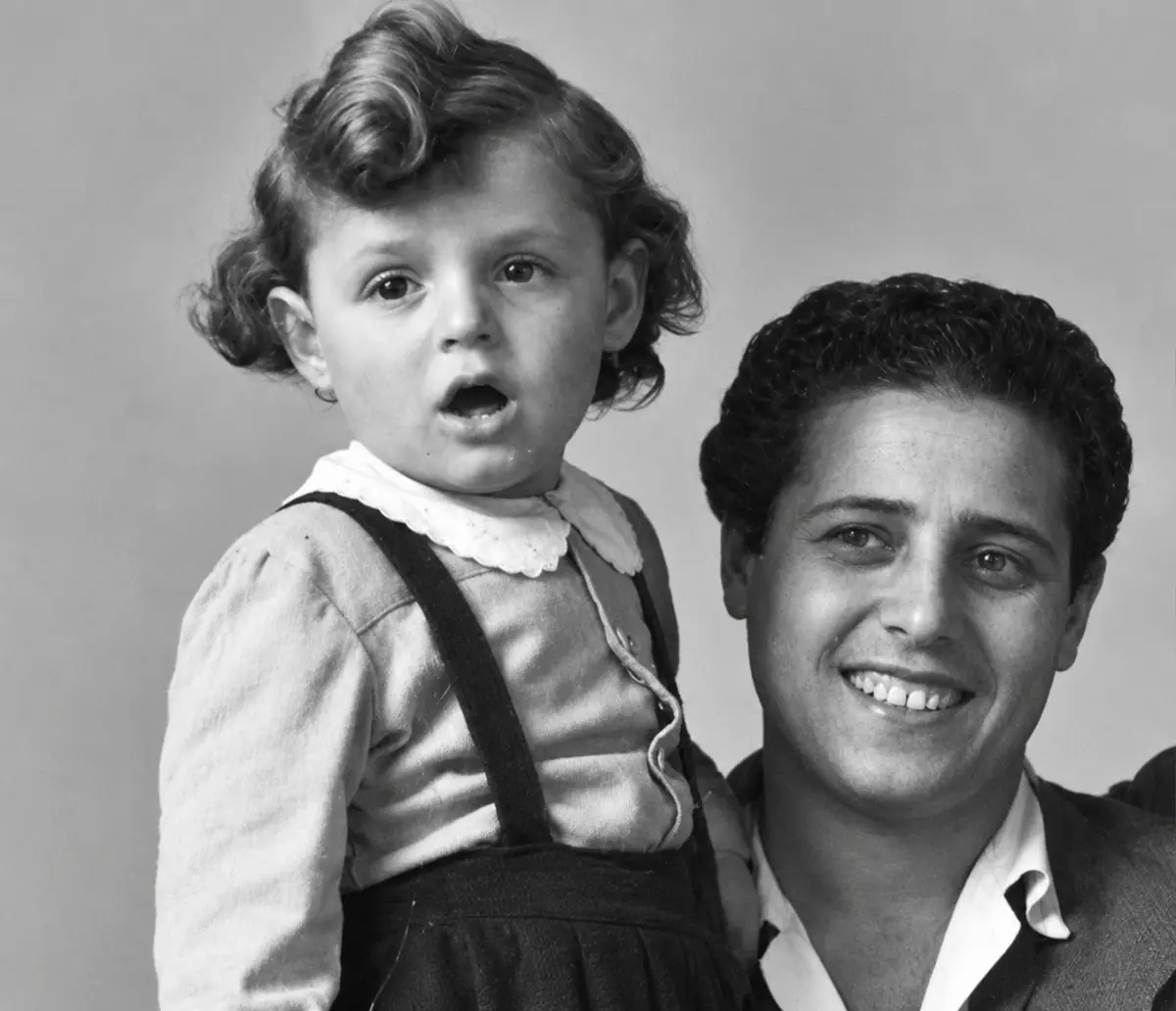 Paola Abbate holding her son Tullio as a baby, 1940s