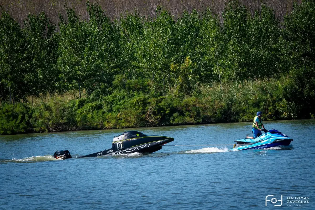 Buby Bertels' damaged Molgaard boat being towed after the San Nazzaro accident