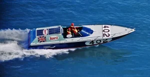 Hot Bovril, race number 402, offshore powerboat at speed, 1970