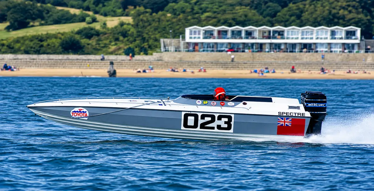 Phantom 23 Spectre racing at speed off the coast