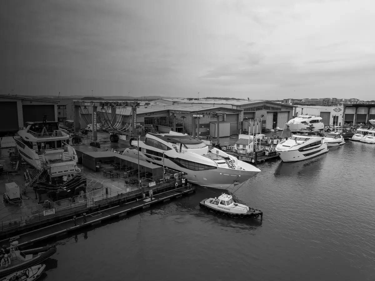 Aerial view of the Sunseeker 134 Superyacht being manoeuvred into Sunseeker's Poole yard