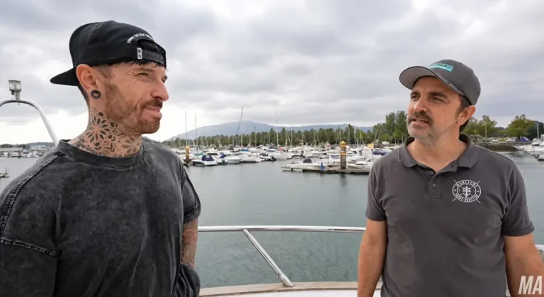 James Tapp of Maritime Yacht Services talking with YouTuber Mat Armstrong aboard the yacht Capri in a Spanish marina