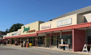 Preakness Shopping Center in Wayne, New Jersey, dressed as a 1980s Miami strip mall for the Miami Vice '85 film set, with Jerry's Liquors, The Frosty Spoon and Palm Star Video shopfronts
