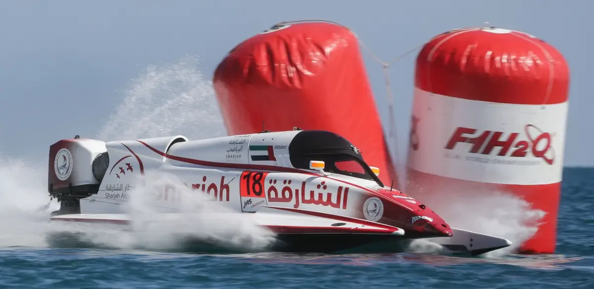 Stefan Arand's Sharjah Team boat 18 rounds a turn buoy at speed during an F1H2O Grand Prix