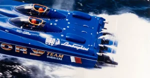 Victory Team's blue Lamborghini-powered offshore catamaran at speed in Made in Dubai livery